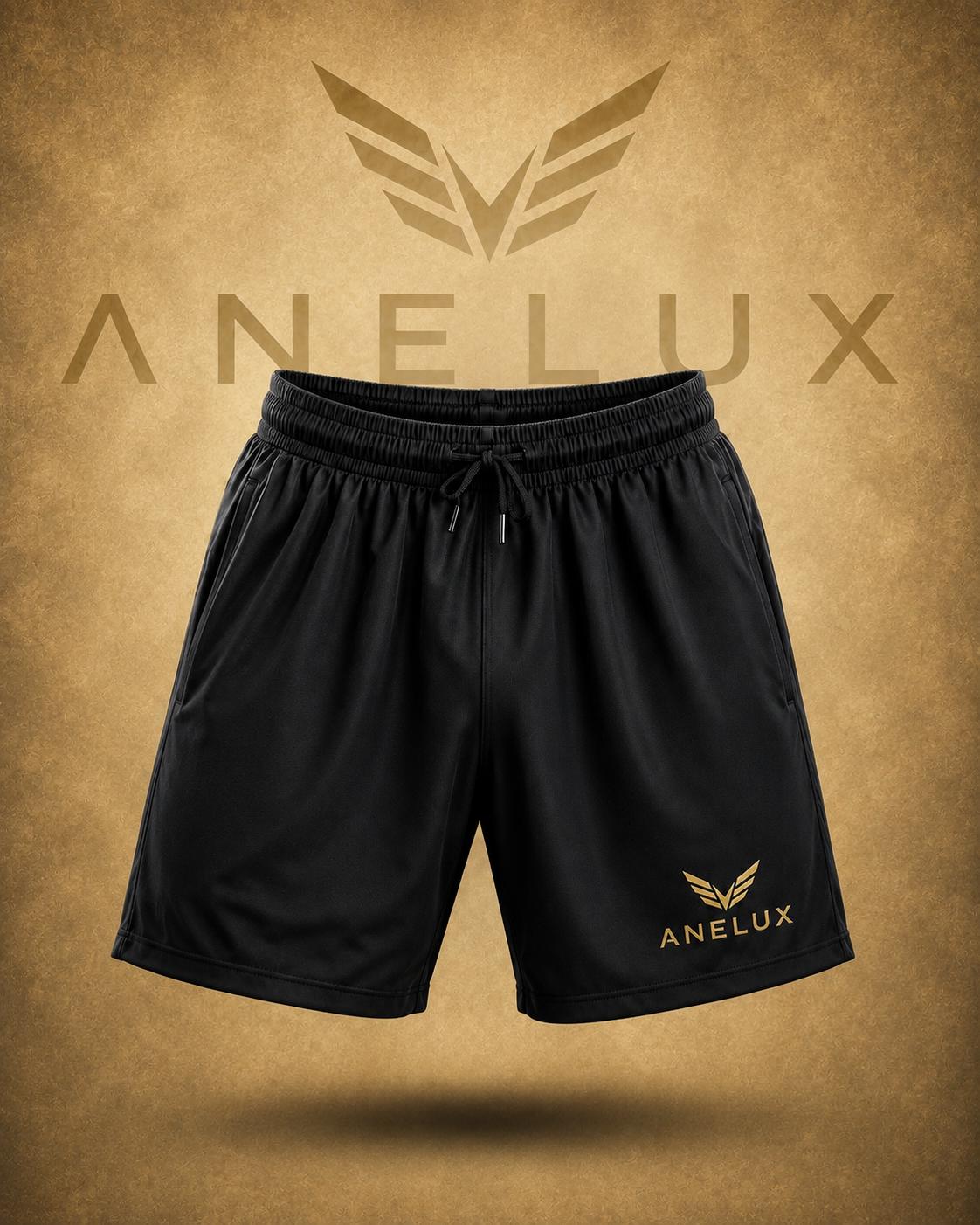 Black custom performance shorts with gold logo by ANELUX Athletics
