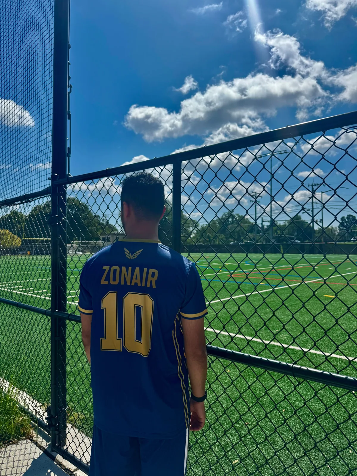 Back view of an ANELUX custom soccer uniform personalized with ZONAIR and number 10